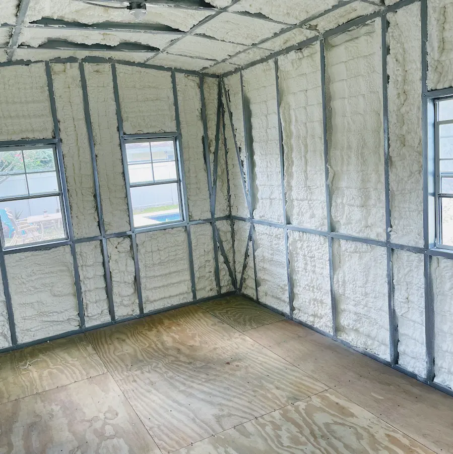Closed-cell spray foam insulation applied to wall cavities in a residential project in Green